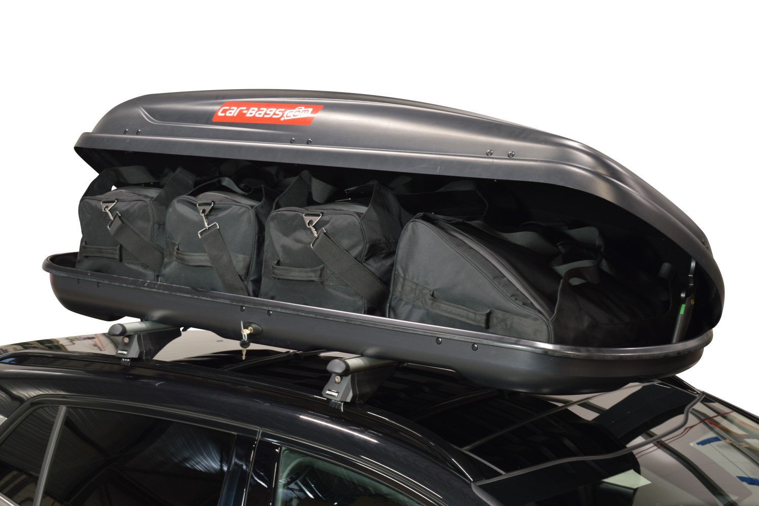 Dakkoffer tassen van CarBags in een dakkoffer